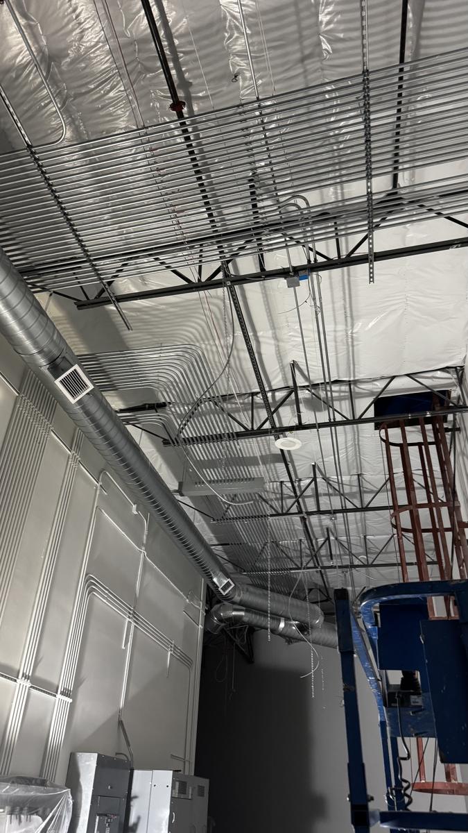 Conduit rack install — commercial ground-up
